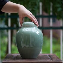 Large tea leaf jars of bean green glaze