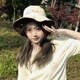 Tingfeng said that students are riding sun hats, spring and summer sun hats that cover the face, versatile big brim, cute girl fisherman hats