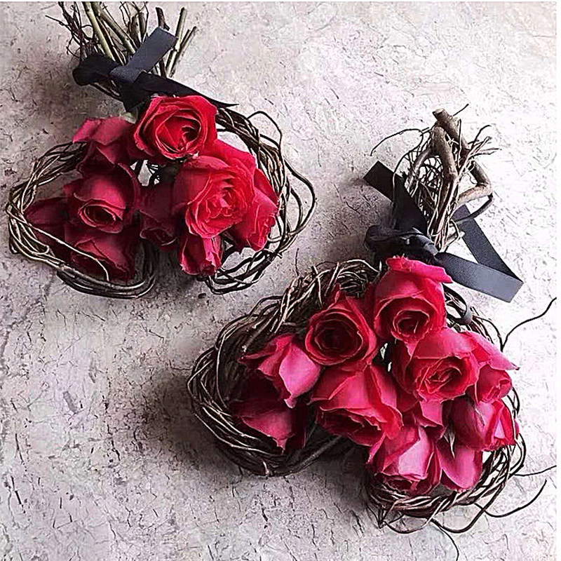 Heart-shaped loving bouquet with material vine heart-shaped gardener arrowed flowers and dry willow