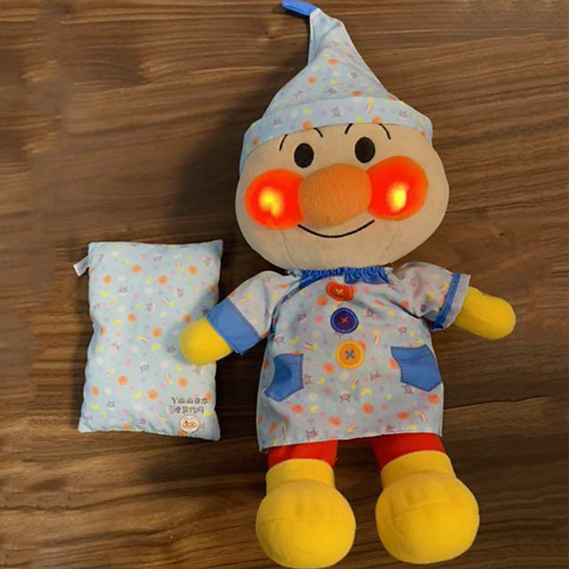 Japanese bread Superman baby sleep appetizing paparazzi baby coaxing to sleep changeable pyjamas speak children's sound and light toys