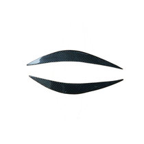 Suitable for Mercedes-Benz W204 carbon fiber headlights C180 C200 C260 C300 modified headlights angry eyes