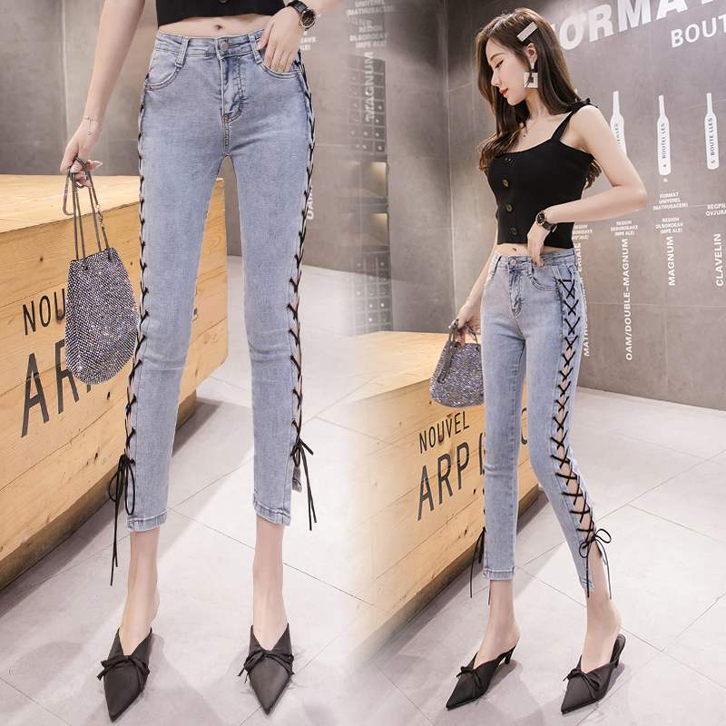 IEFMG Aiyifu beauty trail side strap openwork jeans women 2021 new Korean version of autumn tight feet