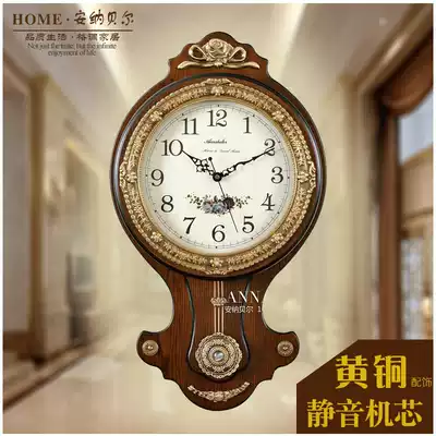 Brass European-style clock clock wall clock Household living room luxury retro creative American quartz clock Wooden wall hanging watch