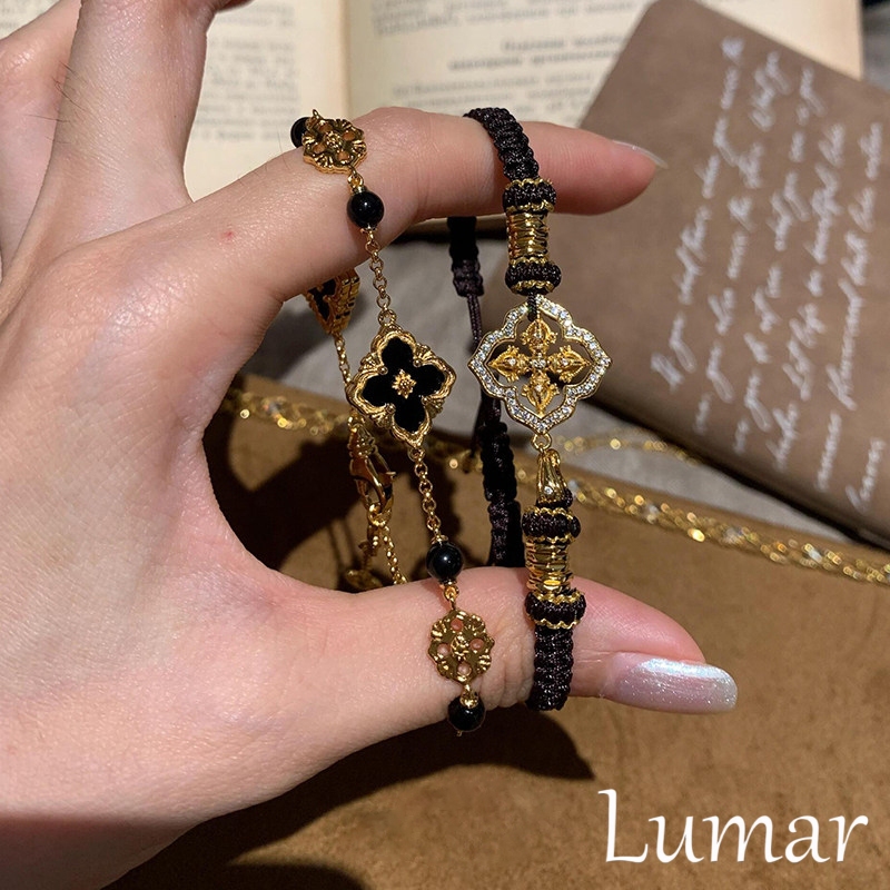 Retro Sparkling Black and Gold Four-Leaf Flower Bracelet for Women 2026 New Hot Style Luxurious and Exquisite Fashionable Stacked Bracelets Retro Sparkling Black and Gold Four-Leaf Flower Bracelet for Women 2026 New Hot Style Luxurious and Exquisite Fashionable Stacked Bracelets