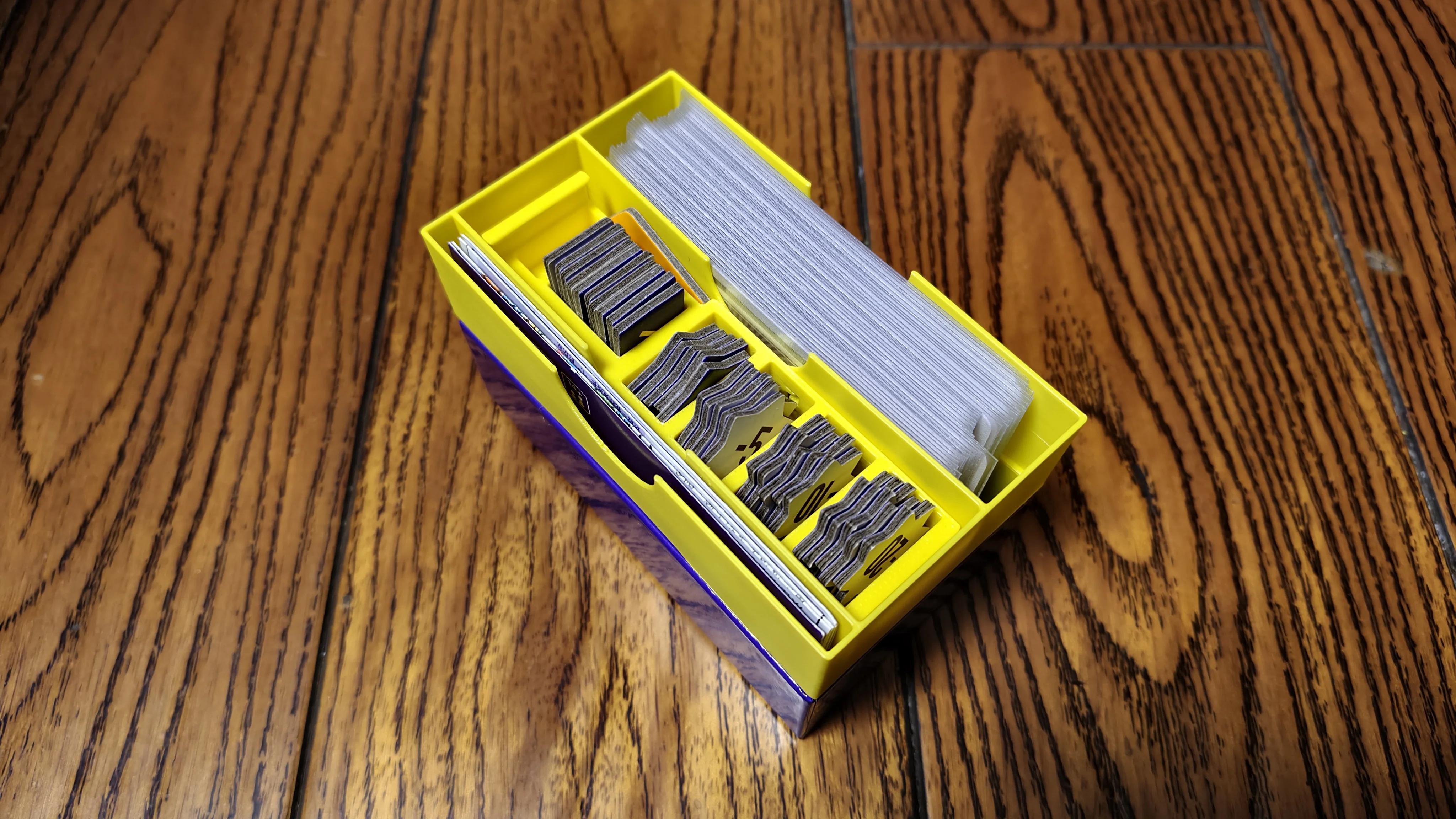 Storage system, storage box, board game accessories, 3D printing