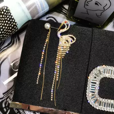 Korean version of the luxury and high-end sense of asymmetrical bird earrings temperament long version of crystal tassel earrings net red ear jewelry women