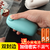 Japan portable mini snack plastic bag sealing machine Fan small sealing bag Small hand-pressed household plastic sealer