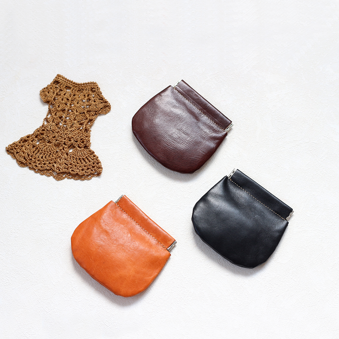 Simple style, light retro literary sense coin bag, creative ingot coin purse, first layer cowhide portable earphone bag