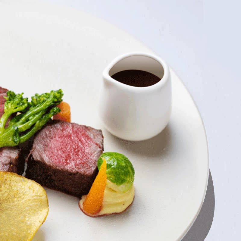 Pure white ceramic milk pot handleless hotel tableware western restaurant steak sauce bottle ceramic milk cup dry ice bottle