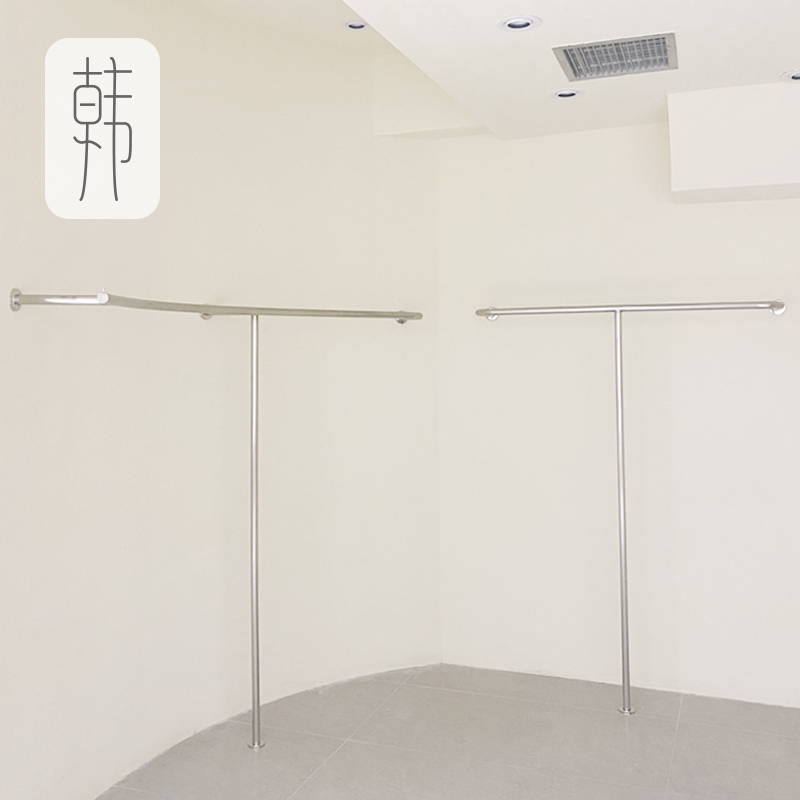 Clothing store shows the shelf girls mounted on wall hanging hanging stainless steel shelves on the front side display shelves