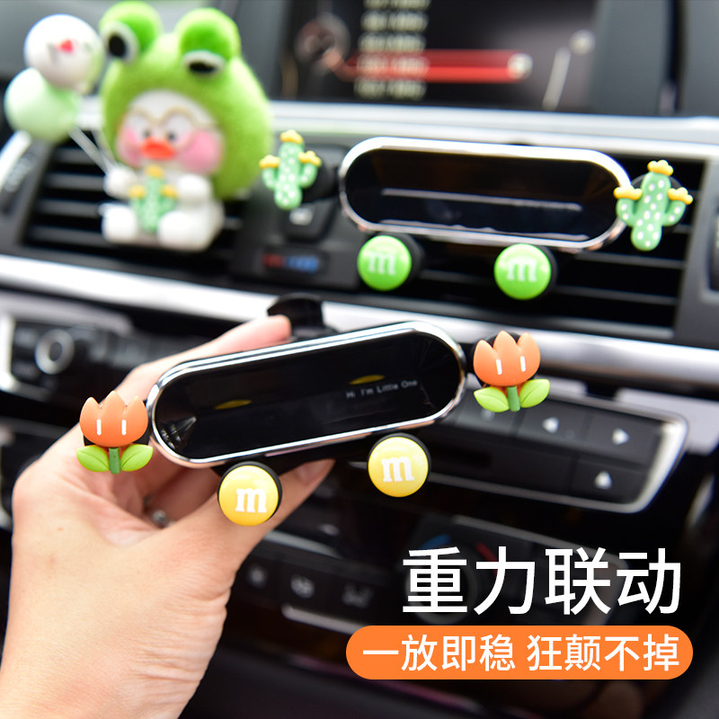 Vehicular mobile phone bracket Idea cute car bracket goddess The air outlet gravity support navigation bracket