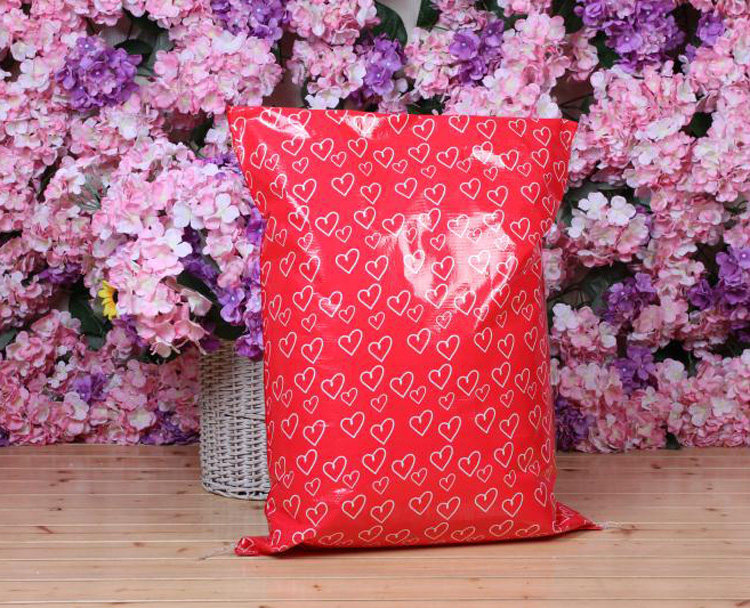 Sample self-sealing thickened color waterproof red heart plush toy gift bag express packing bag coated woven bag