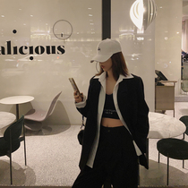 Xiaonian custom black and white fake two-piece design sense blazer female Korean version loose casual wild long-sleeved suit tide