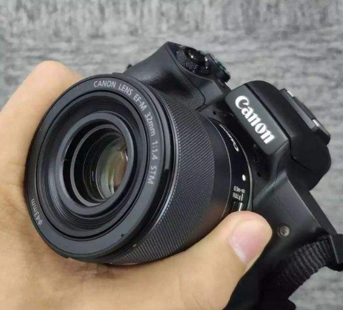 Canon 32 1 4STM 99 new with packaging support for replacement Canon micro-single lens M port