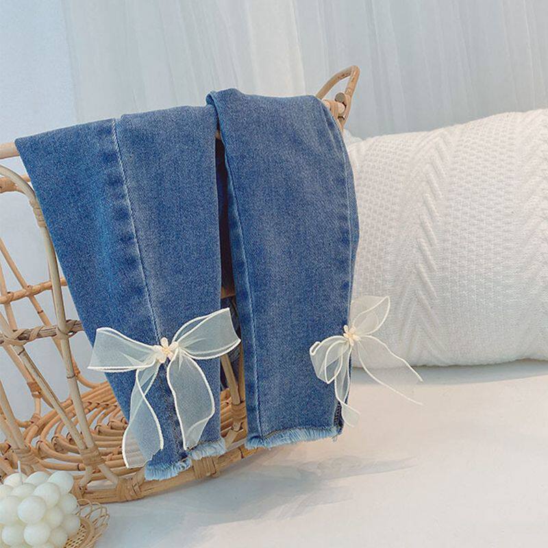Girl's micro horn pants little girl jeans sweet and beautiful butterfly knot net red spring style 100 lap light blue long pants