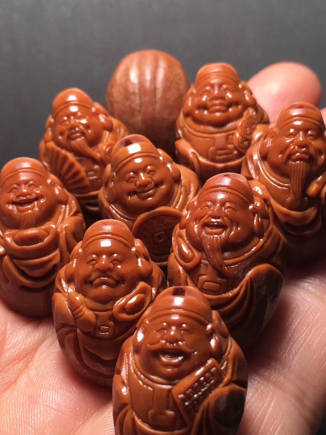 Sugong olive core carving hand string coating eight God of wealth Pure hand carving text play hand chain olive Hu Wen play men