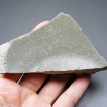 3477 A Southern Song Dynasty Longquan gray celadon-glazed bowl base with lotus petals pattern produced in Hangzhou.