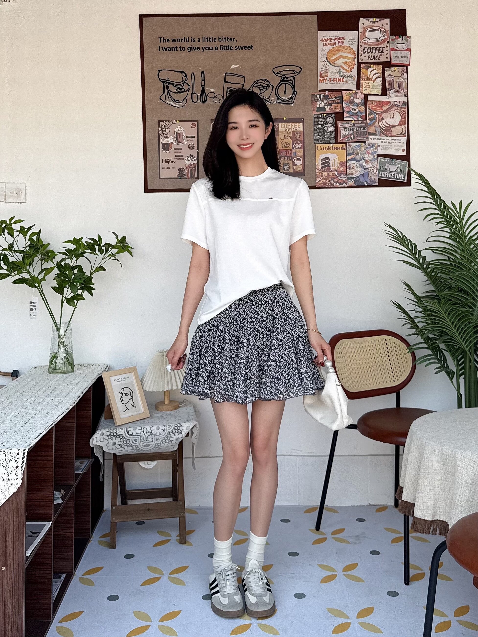 ELLE夏季法式碎花伞裙A字版型遮肉显瘦 碎花图案清新浪漫小众设计别致不撞款