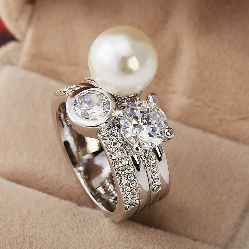 Fashionable ring pearl, accessory, on index finger