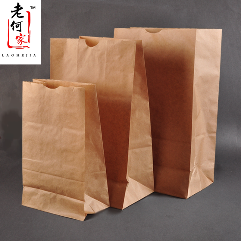 Disposable Square Bottom Cow Leather Packing Paper Bag Food Grade Baking Packing Bag Bread Bag Hand Holding 5 copies of the bag