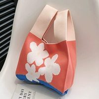 Оранжевая юбка в складку, в цветочек