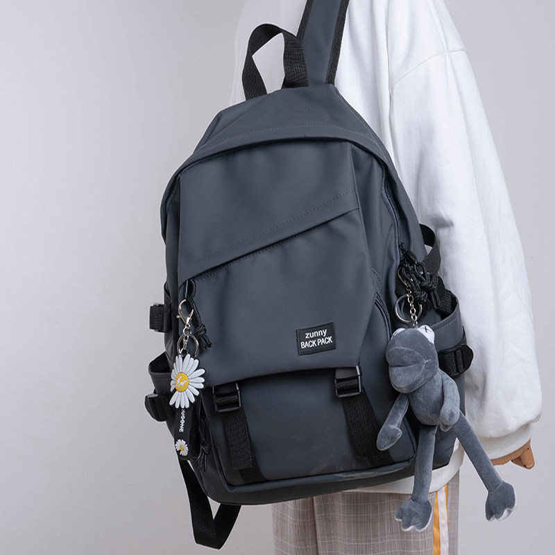 Aigu high-value schoolbag campus solid color Japanese college wind female Korean version high school large capacity ins male backpack