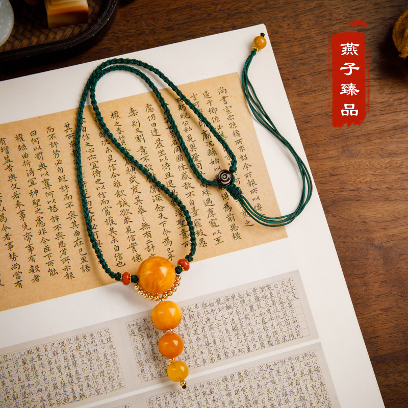 (Yanzi Zhen) 5 64 gr Natural old nectar wax Yuanzhu pearl necklace with chicken oil yellow amber pendant male and female