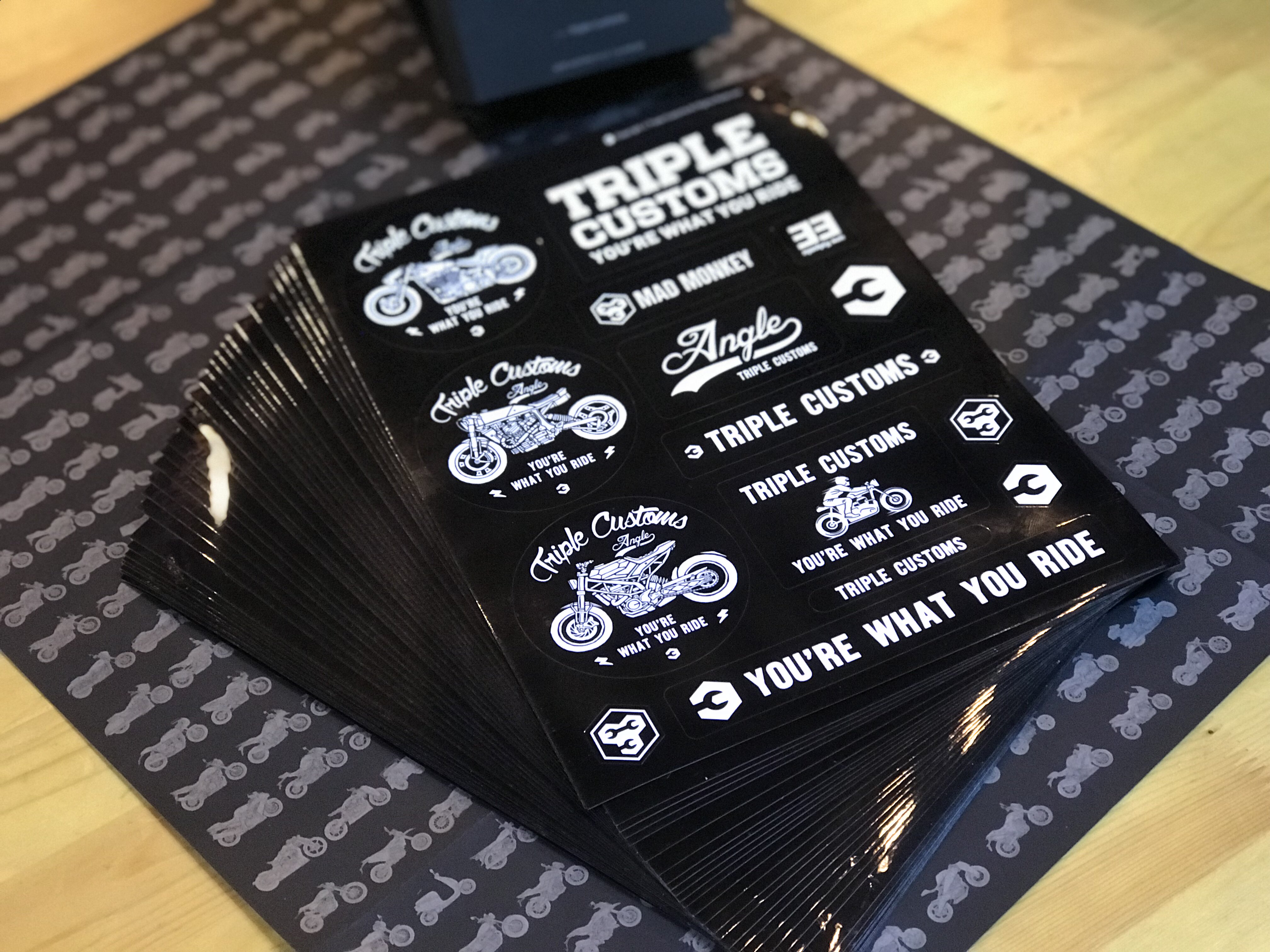 The new sticker for the Triple Customs 2019