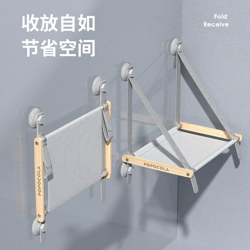 Кошка застряла на висящем гнездовом гнезде Стеклянное балкон Солнце Экспозиция солнечного артефакта