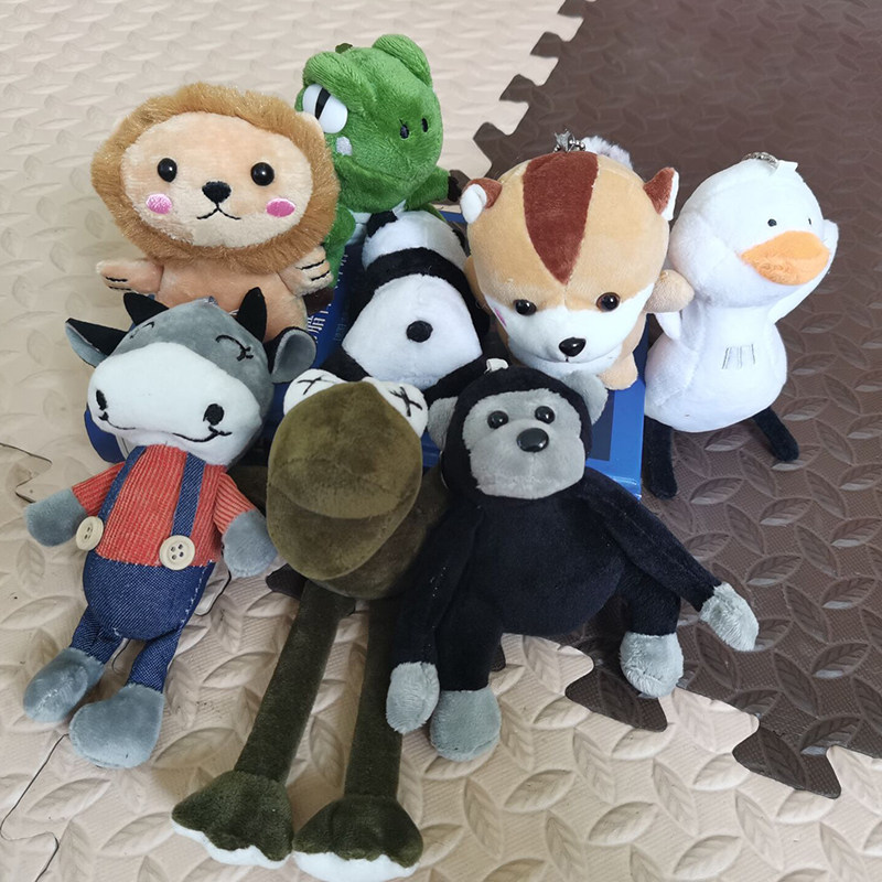 Ugly cute paparazzi hanging adorned doll satchel with cute key buckle pendant men's bag plush bag-Taobao