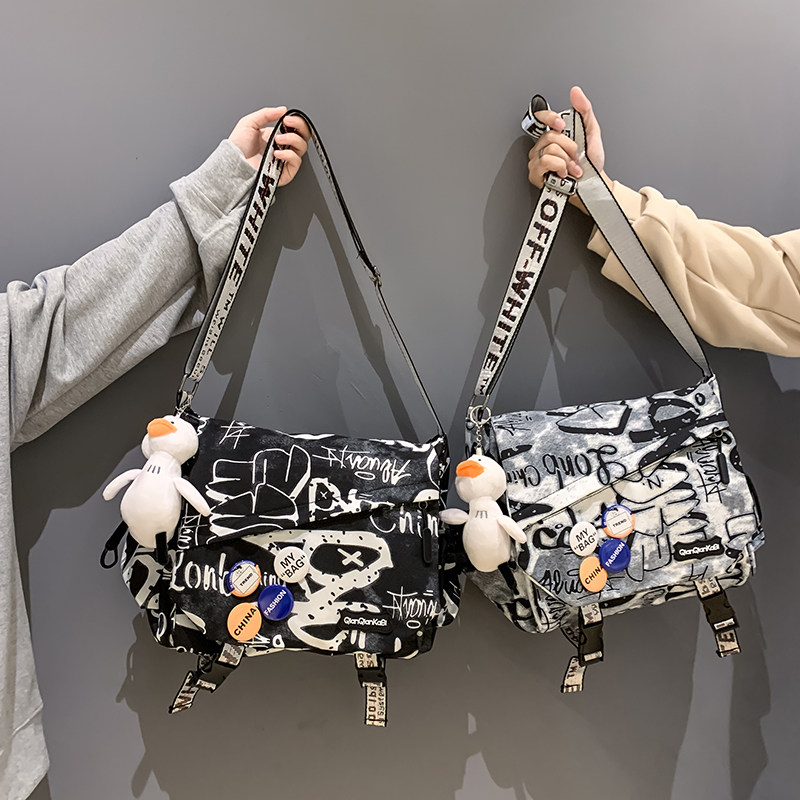 Horizontal shoulder bag youth square Japanese and Korean postman bag casual graffiti text boys trendy brand college students class bag