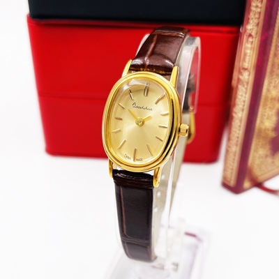 Shanghai Gemstone Flower Oval Goose Egg Small two-hand gold-plated Maillard accessories Simple leather strap quartz watch for women