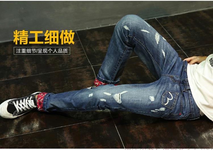 Quần jean nam phiên bản Hàn Quốc của xu hướng cá tính lỗ đầu gối vá vải mùa thu đông mới thủy triều thương hiệu in quần dài - Quần jean quần short jean nam