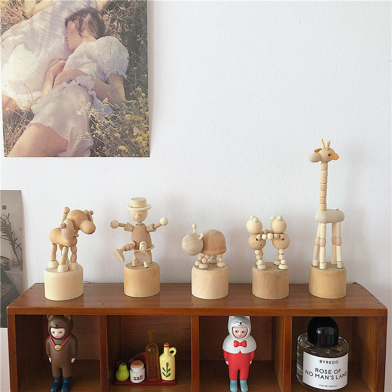 * beautiful little aunt * ins desktop interesting animal small pendulum with wooden head human joint adjustable table top decoration