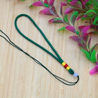 Шаньчжу ставит кусок веревки зеленый