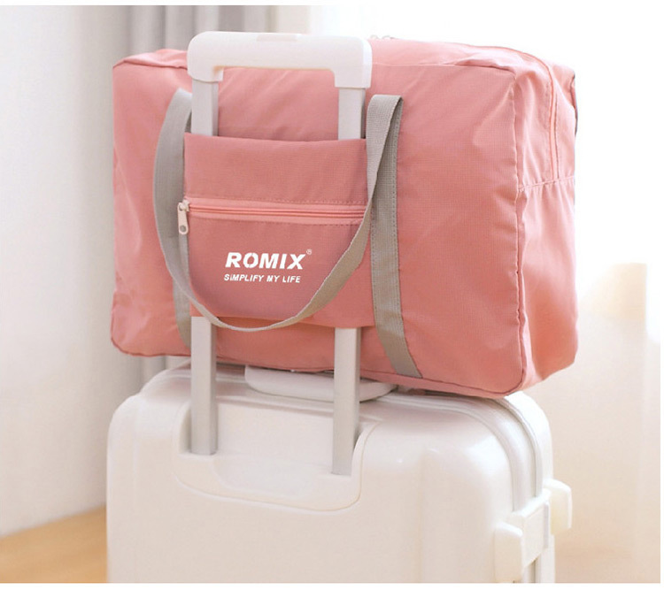 A portable travel containing bag