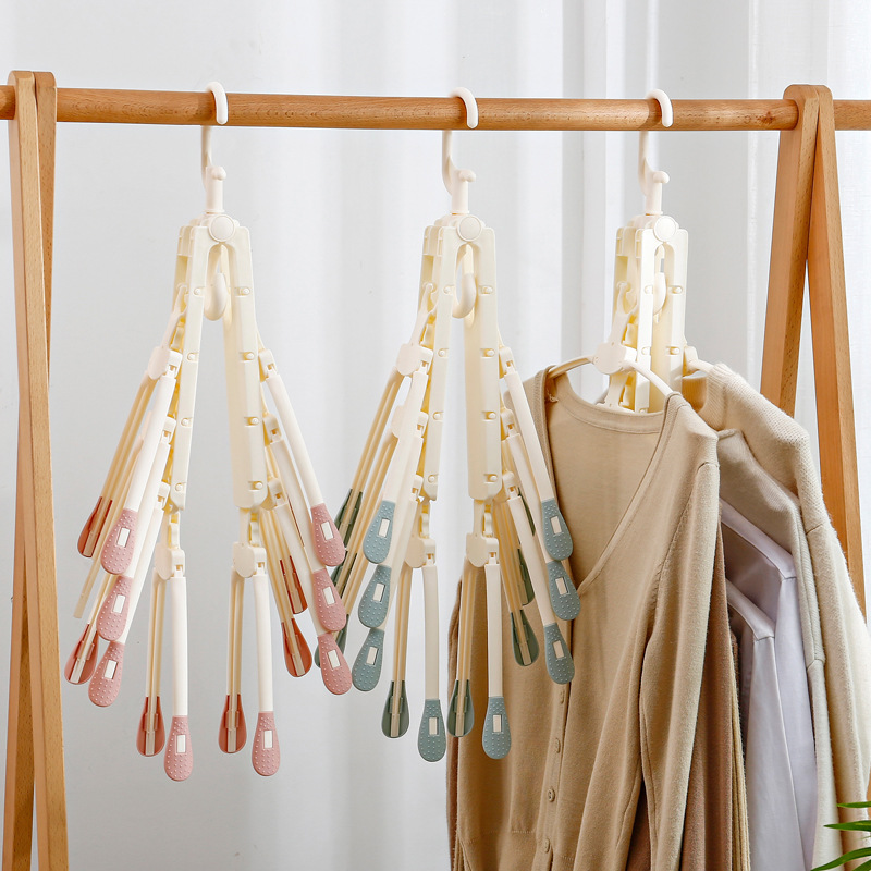 Hanger containing Divine Instrumental Wardrobe Finishing hanging Provincial Space Net Red Wardrobe Home Multi-functional magic hanger