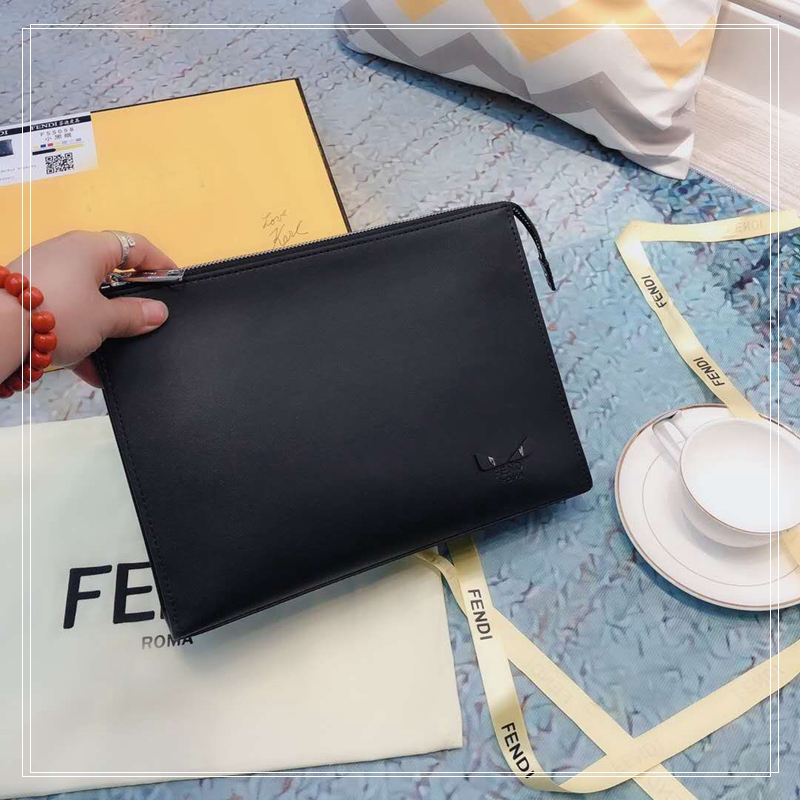 Little monster personality leather small black eye wash bag clutch bag large capacity devil eye leather bag for men and women