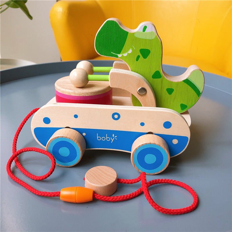 The new tug crocodile knocks on the drum toy car pull wire rope hand pull cart baby pulls 1-2-3-year-old walking toy