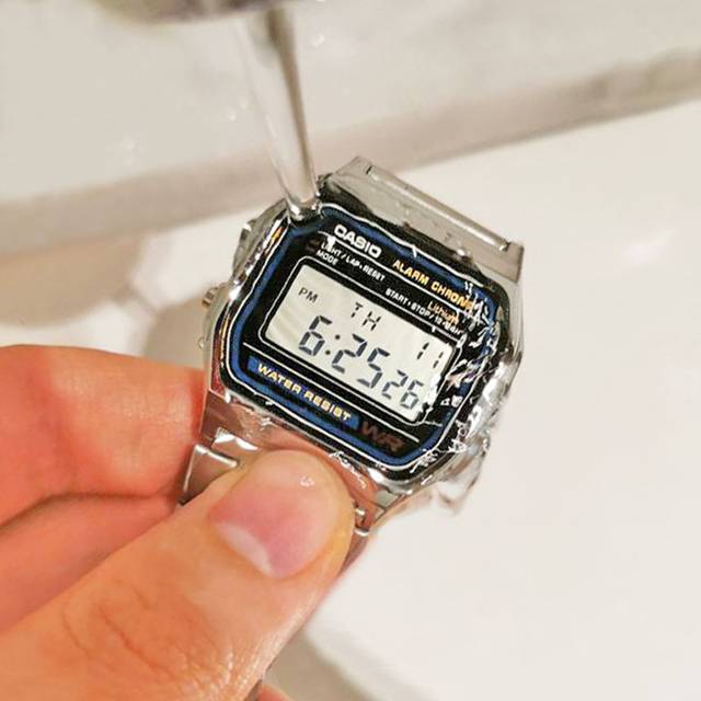 small silver casio watch