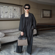 Deconstructionist unbound fashion Peru imports fabric black wool blouses short suit jacket