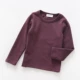 Sơn Đông cửa hàng quần áo trẻ em cửa hàng quần áo trẻ em cotton đáy quần áo trẻ em lớn tay áo thun dài tay màu kẹo