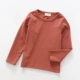 Sơn Đông cửa hàng quần áo trẻ em cửa hàng quần áo trẻ em cotton đáy quần áo trẻ em lớn tay áo thun dài tay màu kẹo