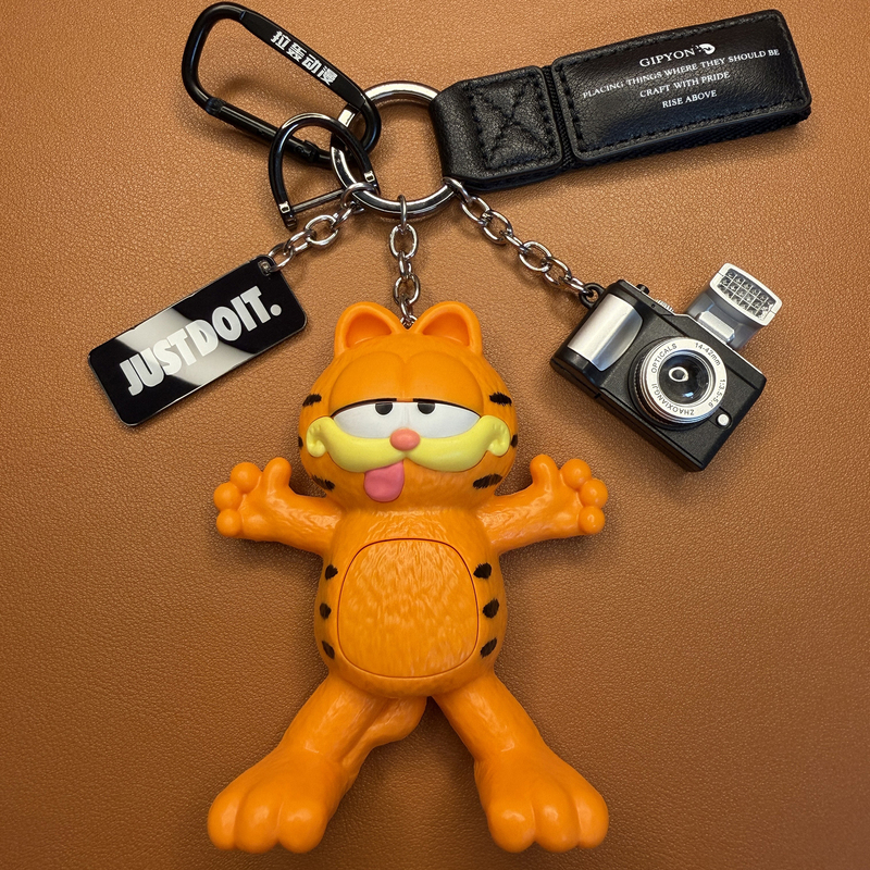 Authentic Garfield Keychain with Sound and Light, Camera, Multifunctional Car Bag Pendant, Cute and Creative Gift for Girls and Boys Authentic Garfield Keychain with Sound and Light, Camera, Multifunctional Car Bag Pendant, Cute and Creative Gift for Girls and Boys