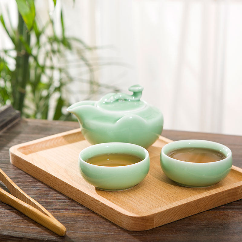 Chinese ceramic tea set complete set suit home living room Kung Fu teapot tea cup small family type tea road green porcelain bubble teapot