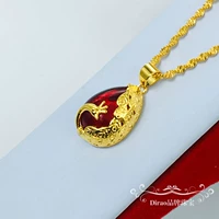 Золотое инкрустированное колье с нефритовым рубиком