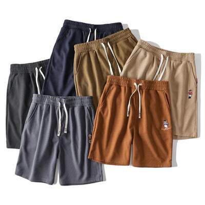 12447 for both men and women! Ten-thousand-stitch embroidered high-weight waffle check drawstring elastic waist five-inch sports shorts