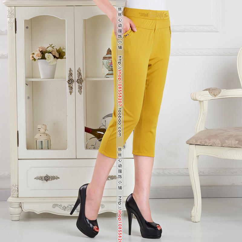 Quần lửng nữ mới màu quần nữ trung niên co giãn mẹ 7 điểm quần thun lưng thun size lớn mặc quần legging - Quần short quần short bò nữ