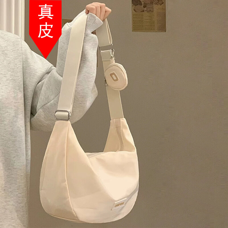 This year's popular canvas bag women's 2023 new hot style dumpling bag large capacity commuter bag fashion Messenger bag