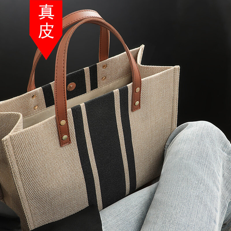 Portable canvas bag women's 2022 new autumn and winter large-capacity commuter large bag all-match tote bag Messenger women's bag